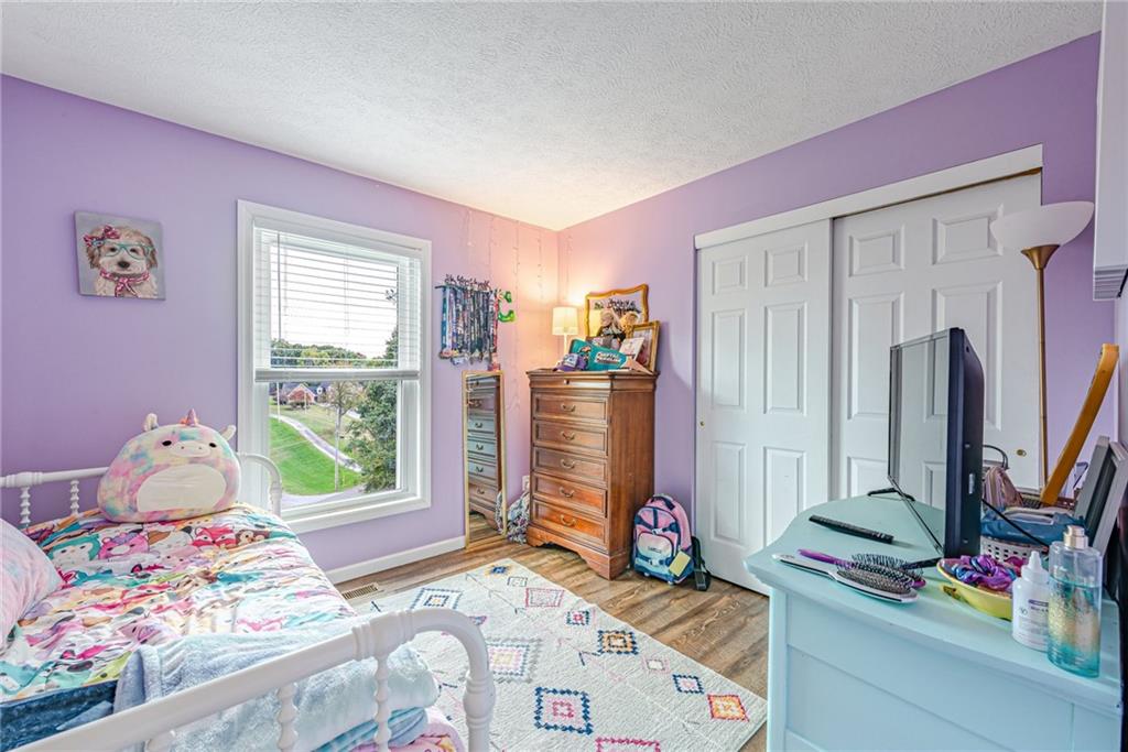 336 Parker Road Sarver, PA 16055 - Photo 9 of 21 a bedroom with a bed and a window