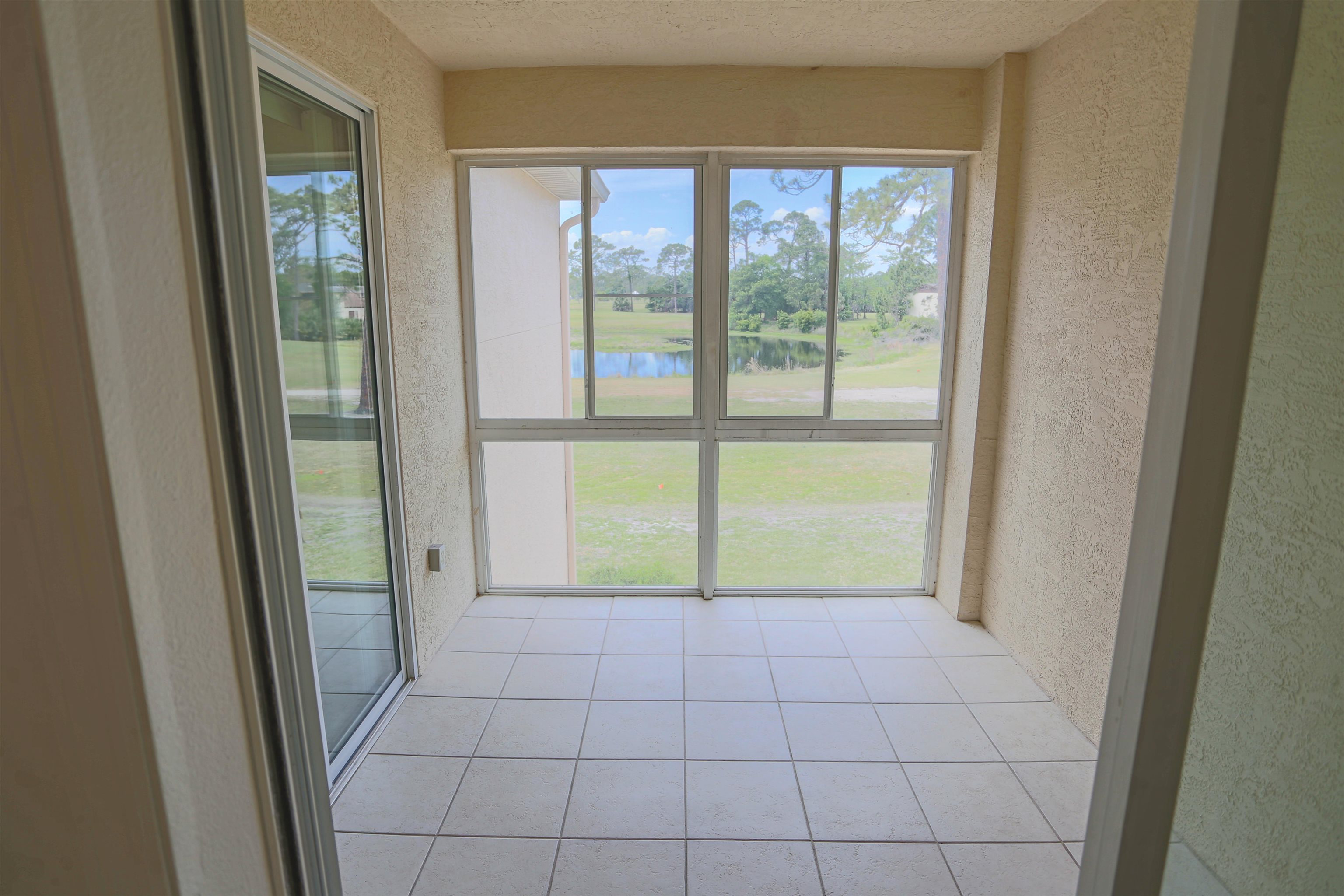 1603 Prestwick Place St. Augustine, FL 32086 - Photo 14 of 44 a view of an empty room and window