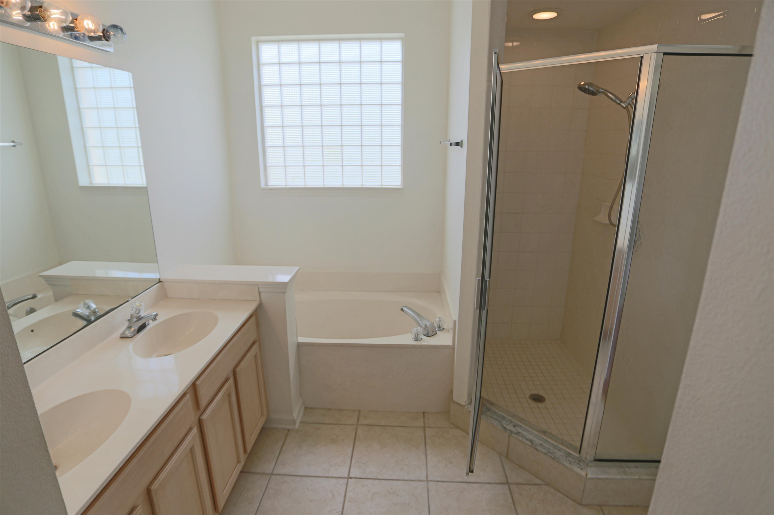 1603 Prestwick Place St. Augustine, FL 32086 - Photo 27 of 44 a bathroom with a sink a toilet and shower