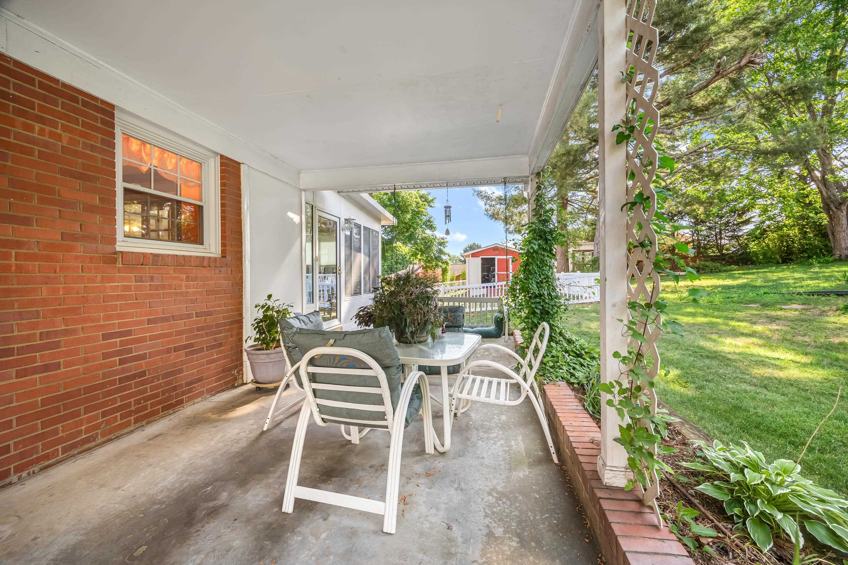 208 Tuxedo Road Staunton, VA 24401 - Photo 6 of 46 a patio with yard glass top table and chairs