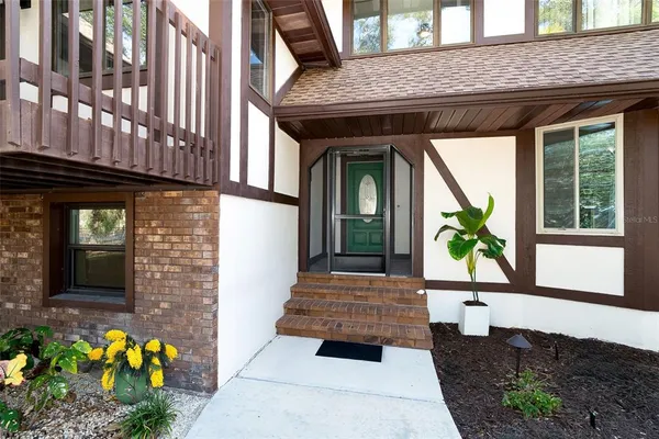 a living room with furniture fireplace and a fireplace