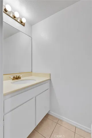 a view of an empty room with stairs