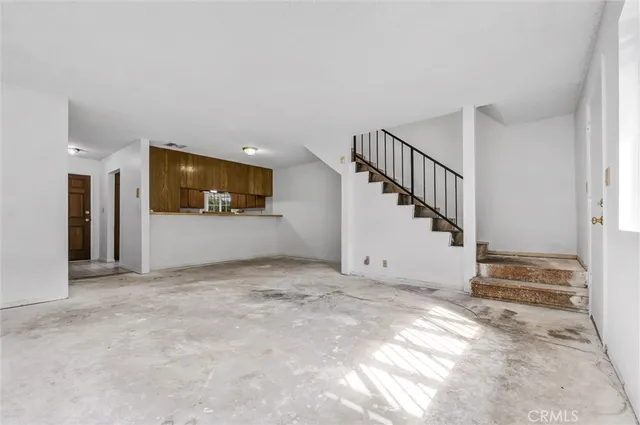 a view of a hallway with entryway