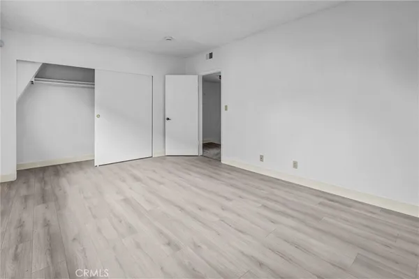 a bathroom with a shower and a toilet