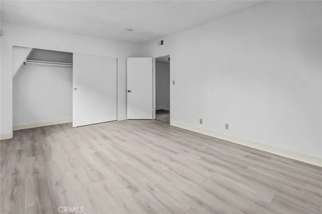 a bathroom with a shower and a toilet