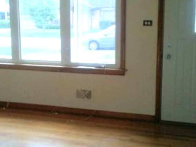 9029 Sproat Avenue Oak Lawn, IL 60453 - Photo 4 of 8 a view of a window in a room