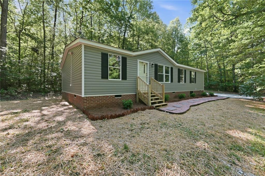 6041 Burlington Road Gibsonville, NC 27249 - Photo 2 of 29