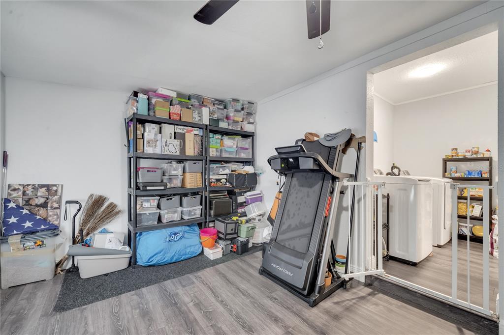 1226 Pine Street Orlando, FL 32824 - Photo 19 of 46 a view of a room with gym equipment