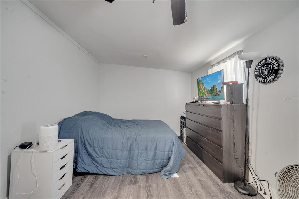 1226 Pine Street Orlando, FL 32824 - Photo 20 of 46 a living room with furniture and wooden floor