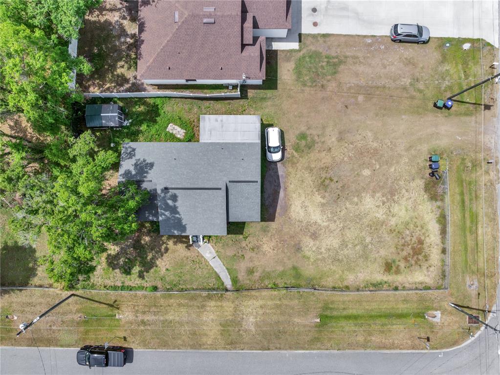 1226 Pine Street Orlando, FL 32824 - Photo 37 of 46 an aerial view of a house with a lake view