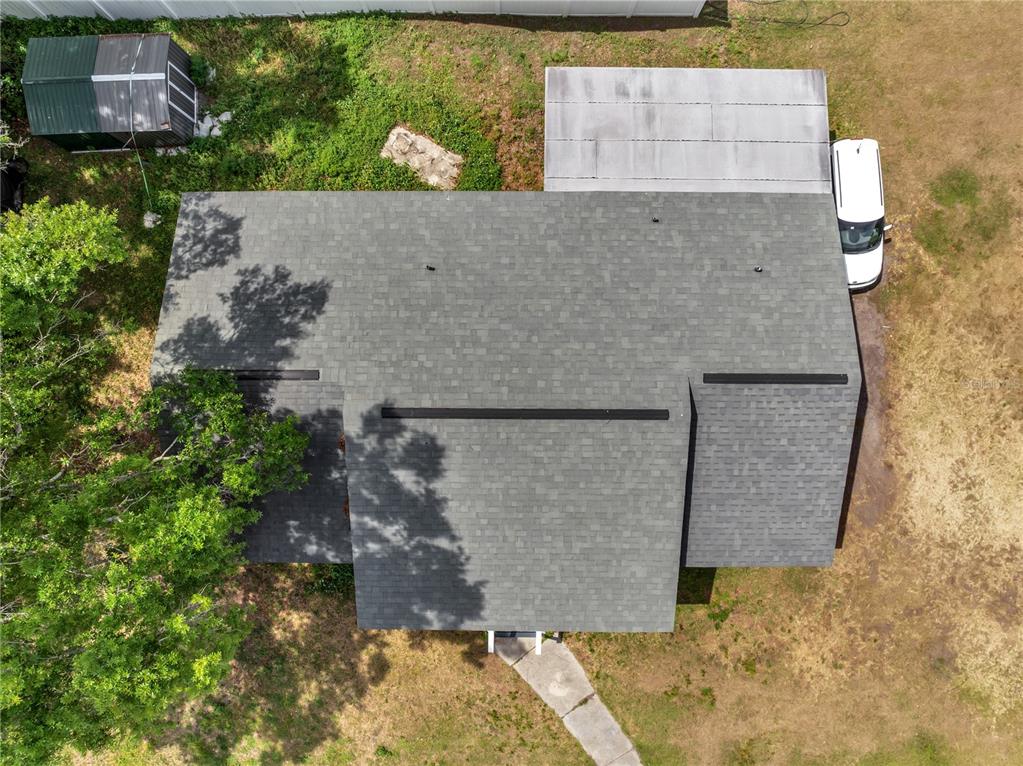 1226 Pine Street Orlando, FL 32824 - Photo 38 of 46 an aerial view of a house with a yard