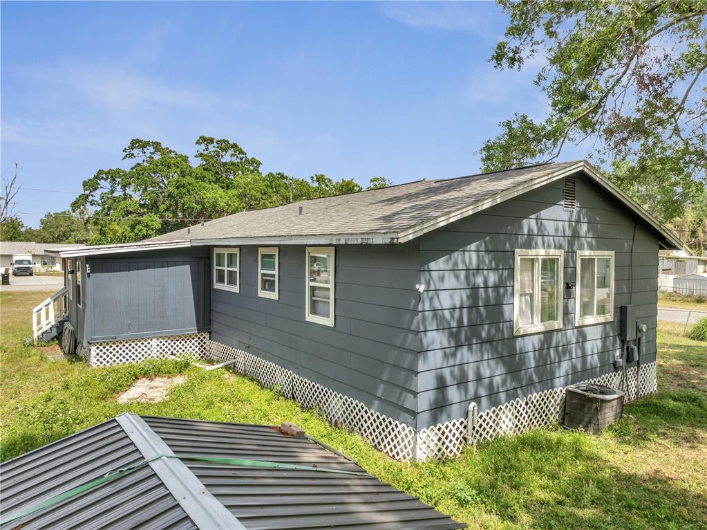 1226 Pine Street Orlando, FL 32824 - Photo 40 of 46 a front view of a house with a yard