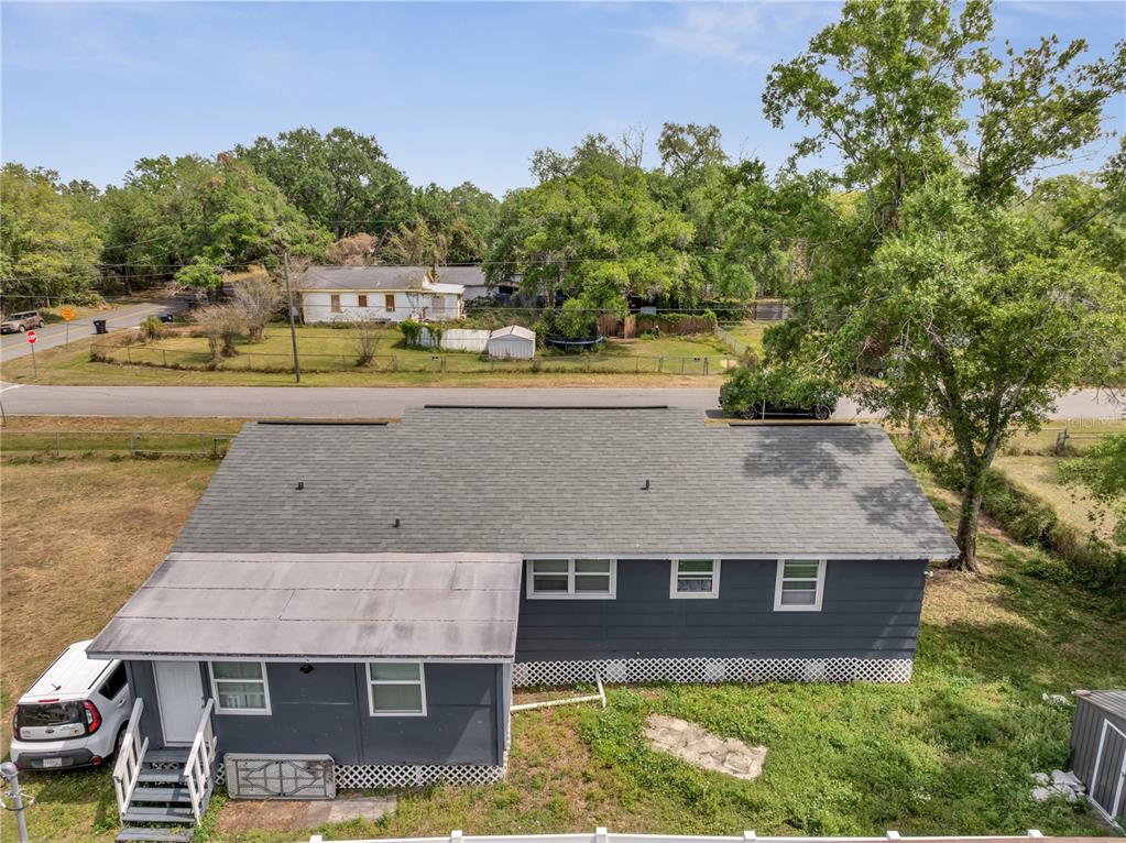 1226 Pine Street Orlando, FL 32824 - Photo 41 of 46 an aerial view of a house with a swimming pool