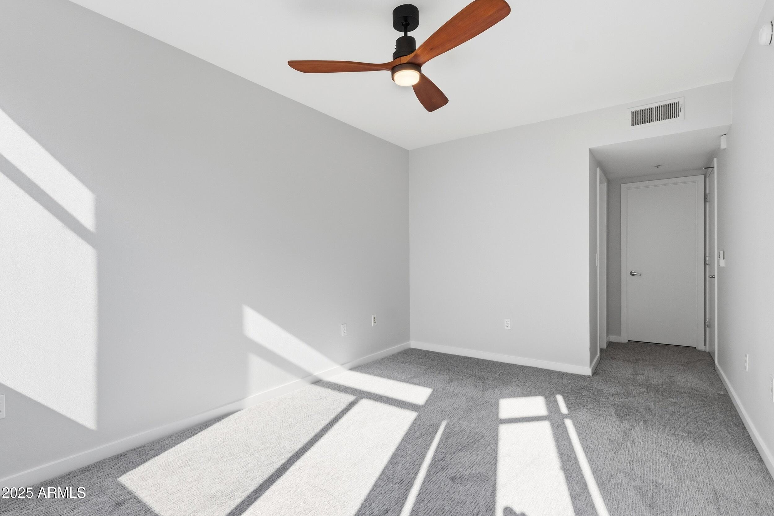 3633 North 3rd Avenue, Unit 2009 Phoenix, AZ 85013 - Photo 22 of 36 a view of room with a ceiling fan