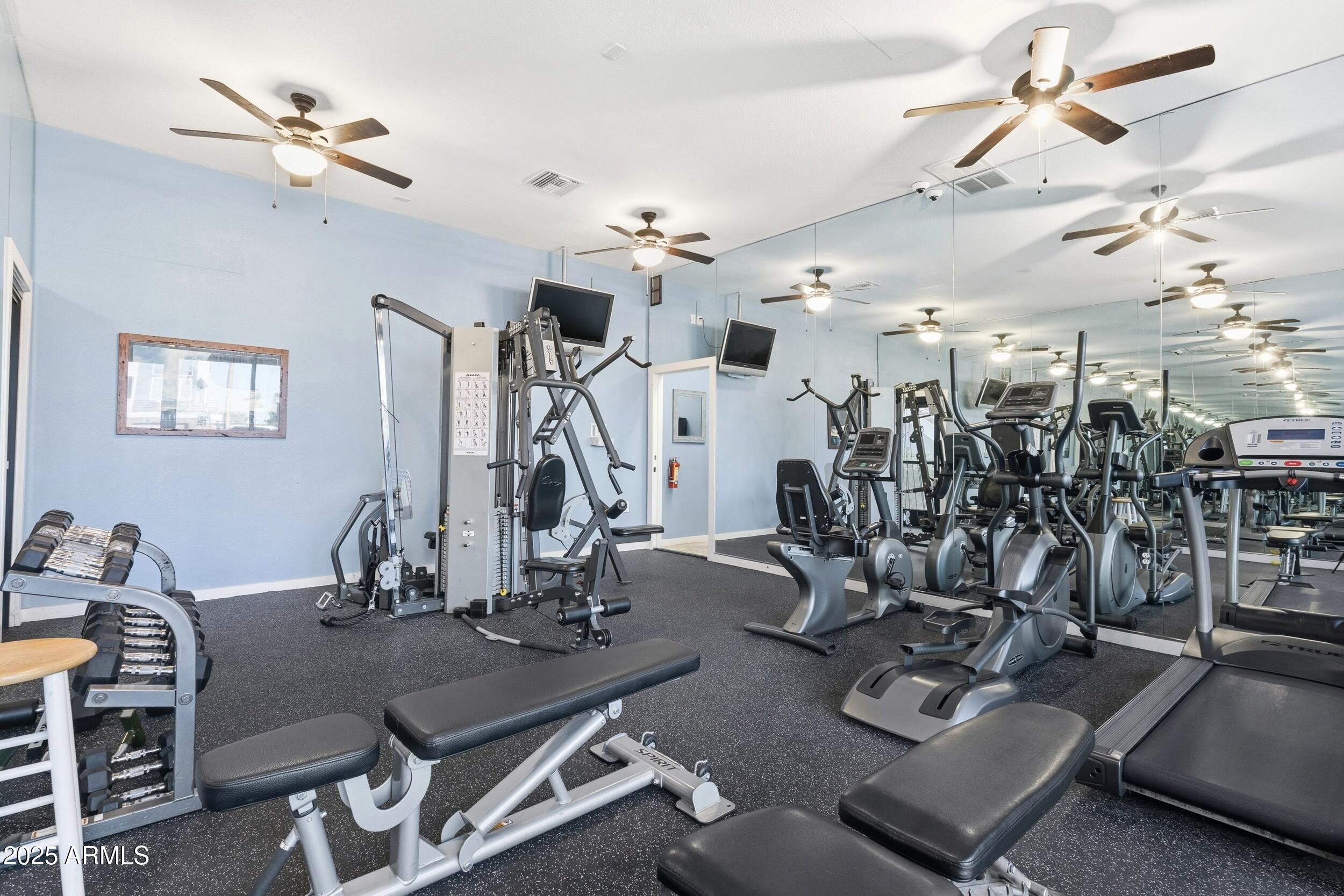3633 North 3rd Avenue, Unit 2009 Phoenix, AZ 85013 - Photo 25 of 36 a room with gym equipment and view of gym equipment