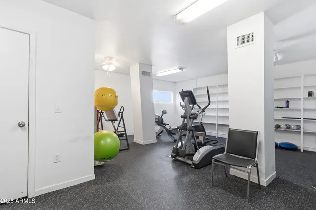 a view of a room with gym equipment