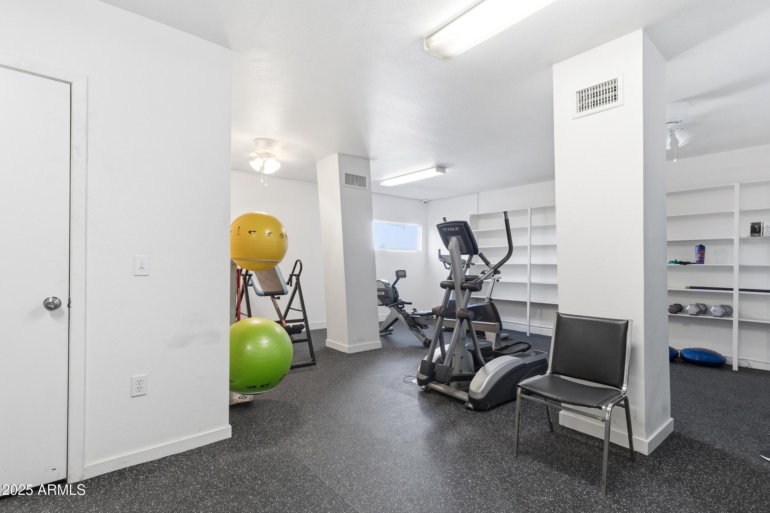 3633 North 3rd Avenue, Unit 2009 Phoenix, AZ 85013 - Photo 26 of 36 a view of a room with gym equipment