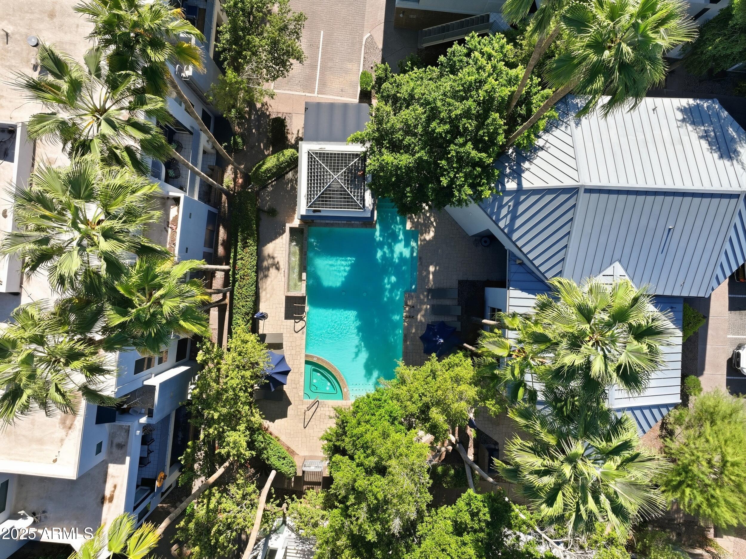 3633 North 3rd Avenue, Unit 2009 Phoenix, AZ 85013 - Photo 29 of 36 front view of a house with a tree