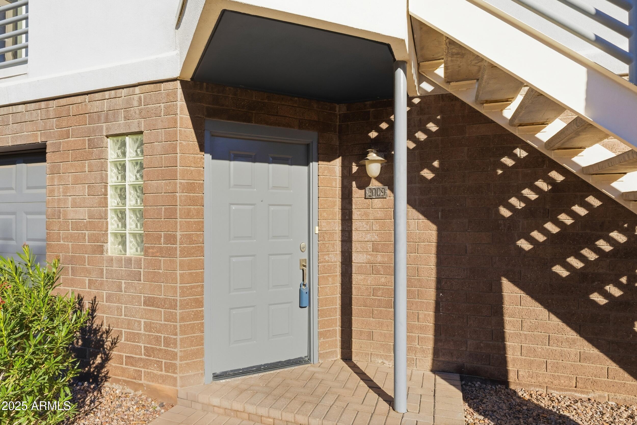 3633 North 3rd Avenue, Unit 2009 Phoenix, AZ 85013 - Photo 8 of 36 a view of a house with a door