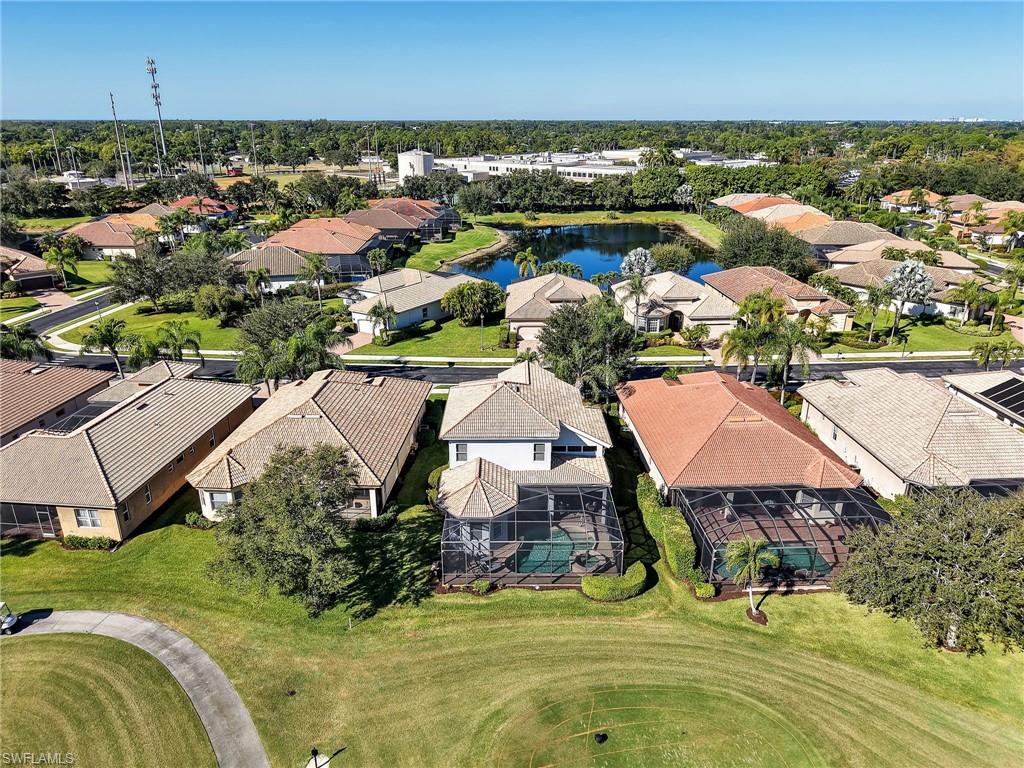 6096 Dogleg Drive Naples, FL 34113 - Photo 11 of 49 an aerial view of residential houses with outdoor space