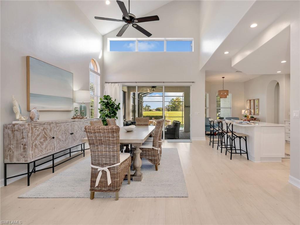 6096 Dogleg Drive Naples, FL 34113 - Photo 6 of 49 a view of a dining room with furniture
