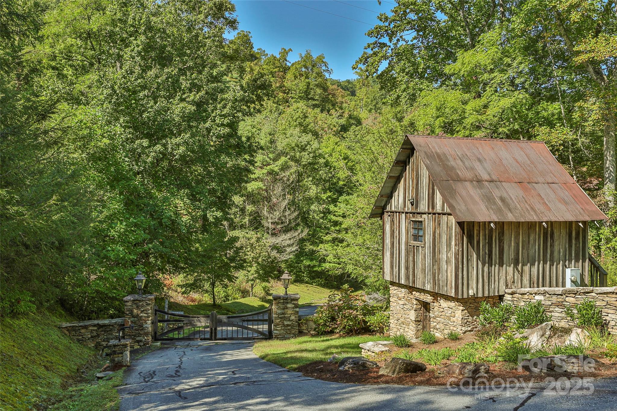 Lot 39 Sweet Spring Trail, Unit 39 Glenville, NC 28736 - Photo 11 of 27 a view of a back yard