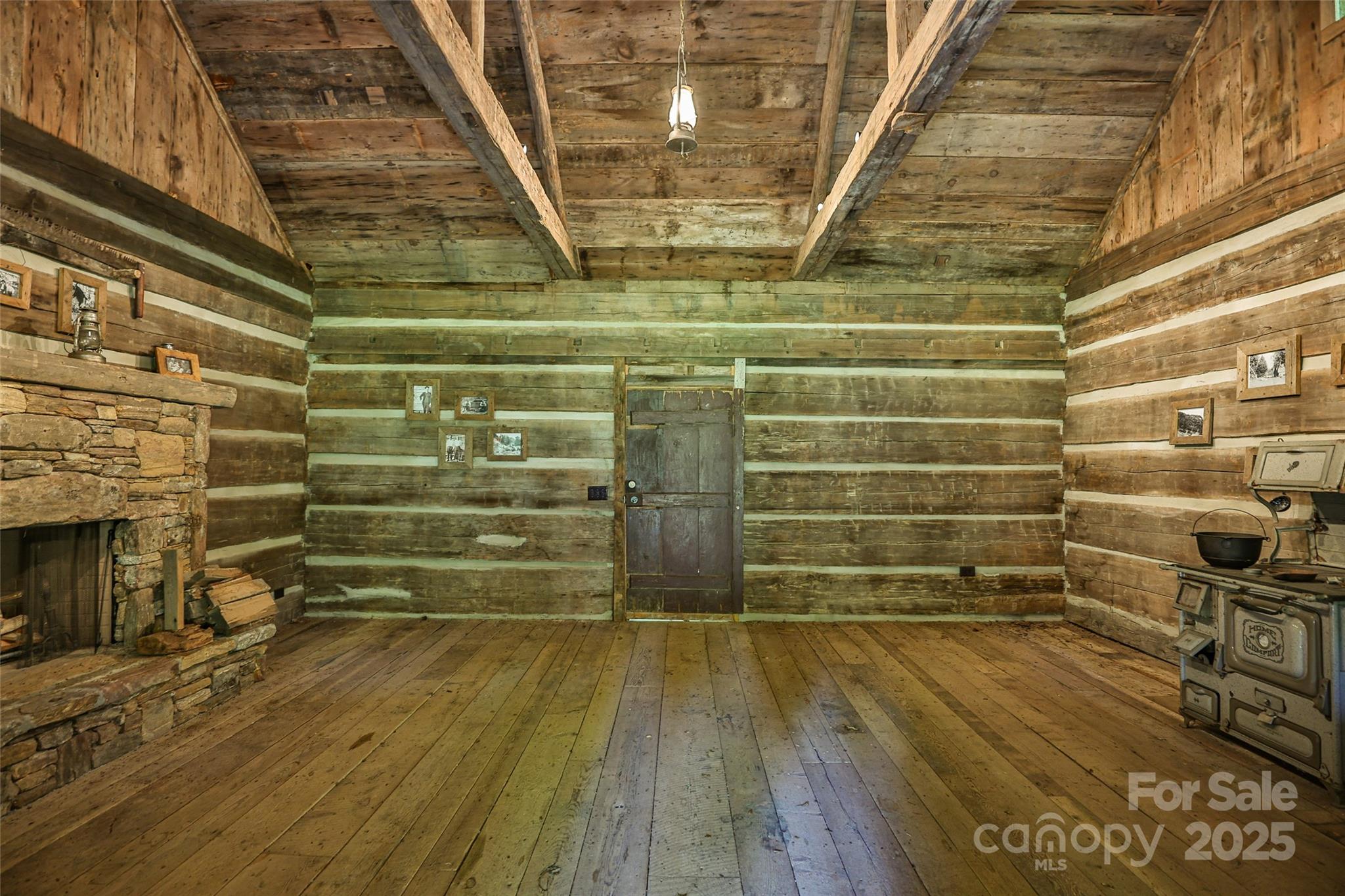 Lot 39 Sweet Spring Trail, Unit 39 Glenville, NC 28736 - Photo 16 of 27 a view of empty room with wooden floor