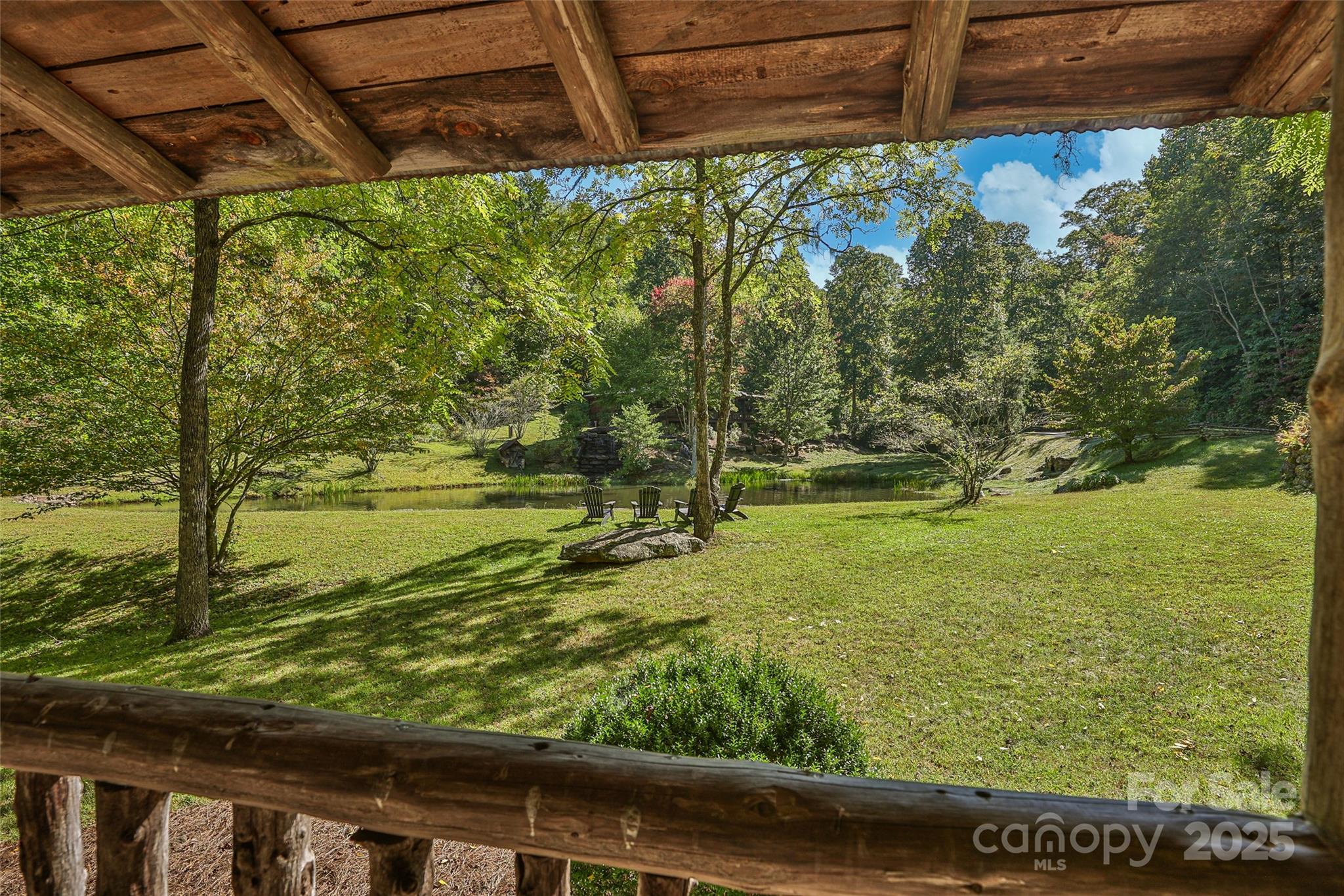 Lot 39 Sweet Spring Trail, Unit 39 Glenville, NC 28736 - Photo 17 of 27 a view of a yard