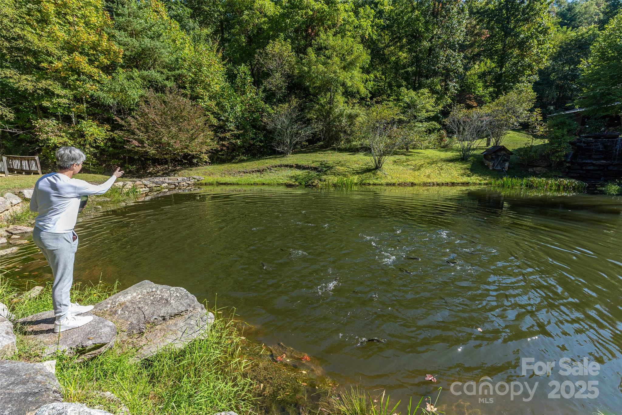 Lot 39 Sweet Spring Trail, Unit 39 Glenville, NC 28736 - Photo 18 of 27 a view of a lake from a yard