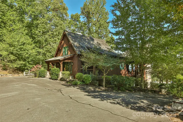 a view of a swimming pool with a yard