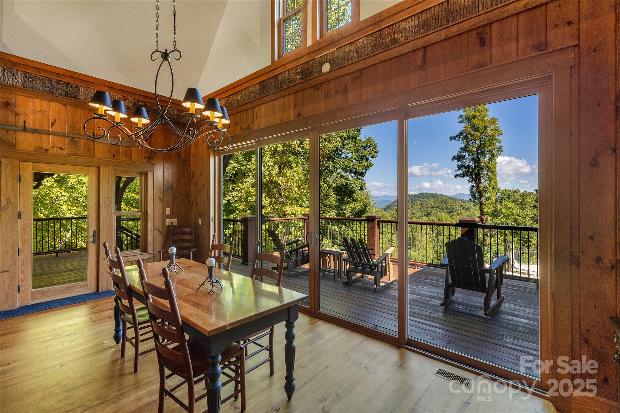 Lot 39 Sweet Spring Trail, Unit 39 Glenville, NC 28736 - Photo 23 of 27 a view of a dining room with furniture window and outside view