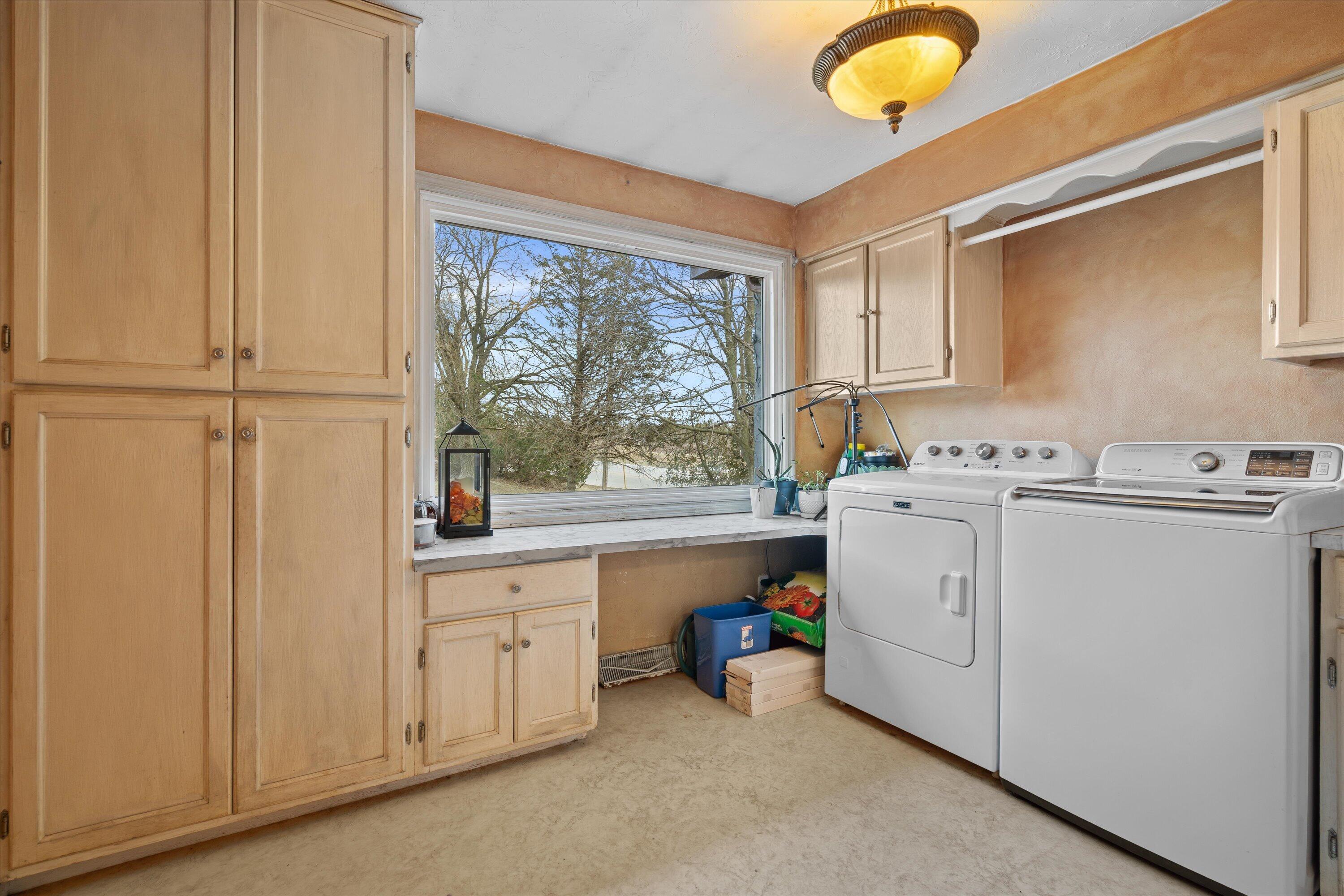4804 County Hwy VV Two Rivers, WI 54241 - Photo 7 of 60 Large laundry room with ample storage & large window