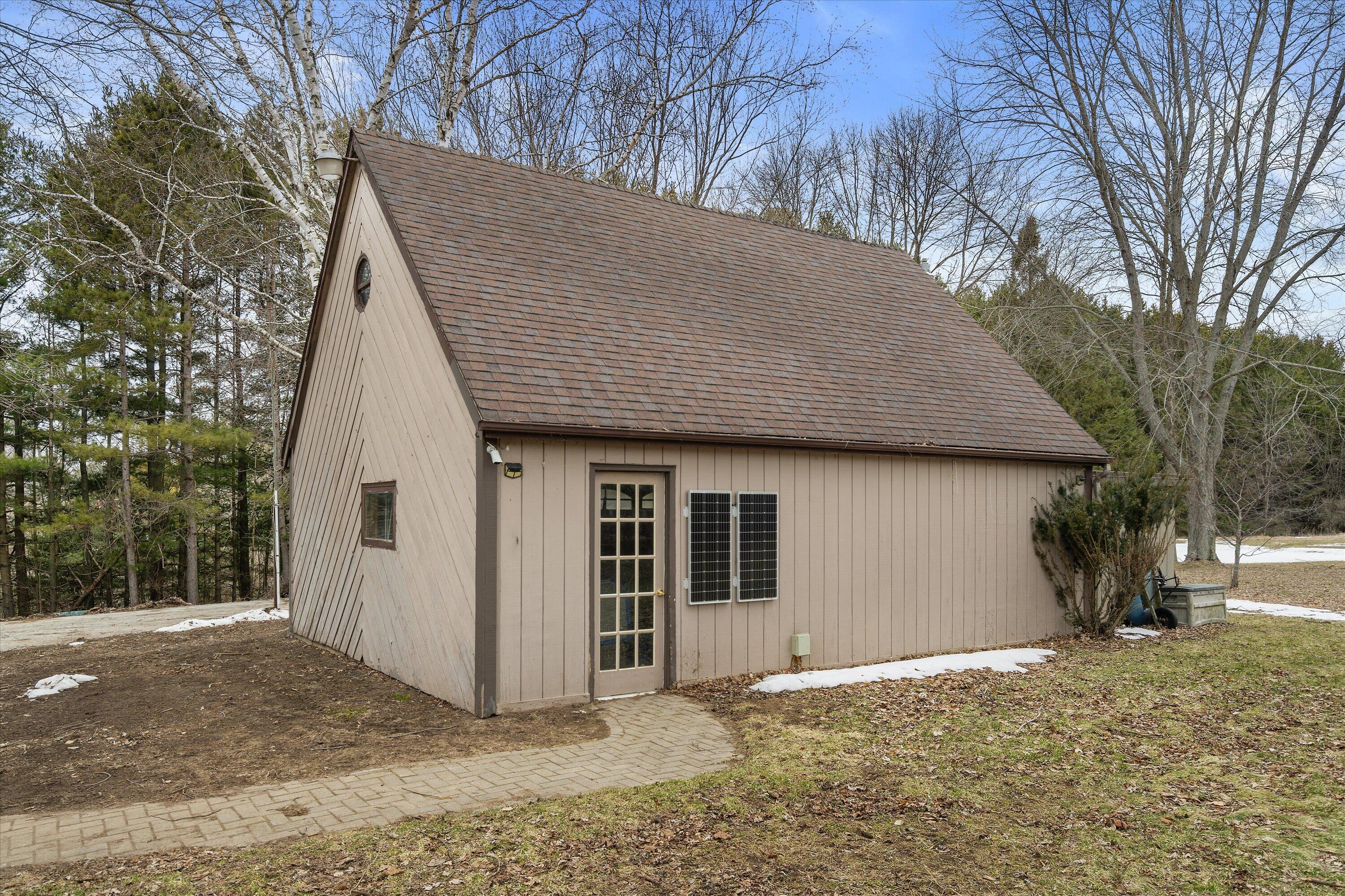 4804 County Hwy VV Two Rivers, WI 54241 - Photo 31 of 60 Generous 2-car garage w/loft and work area