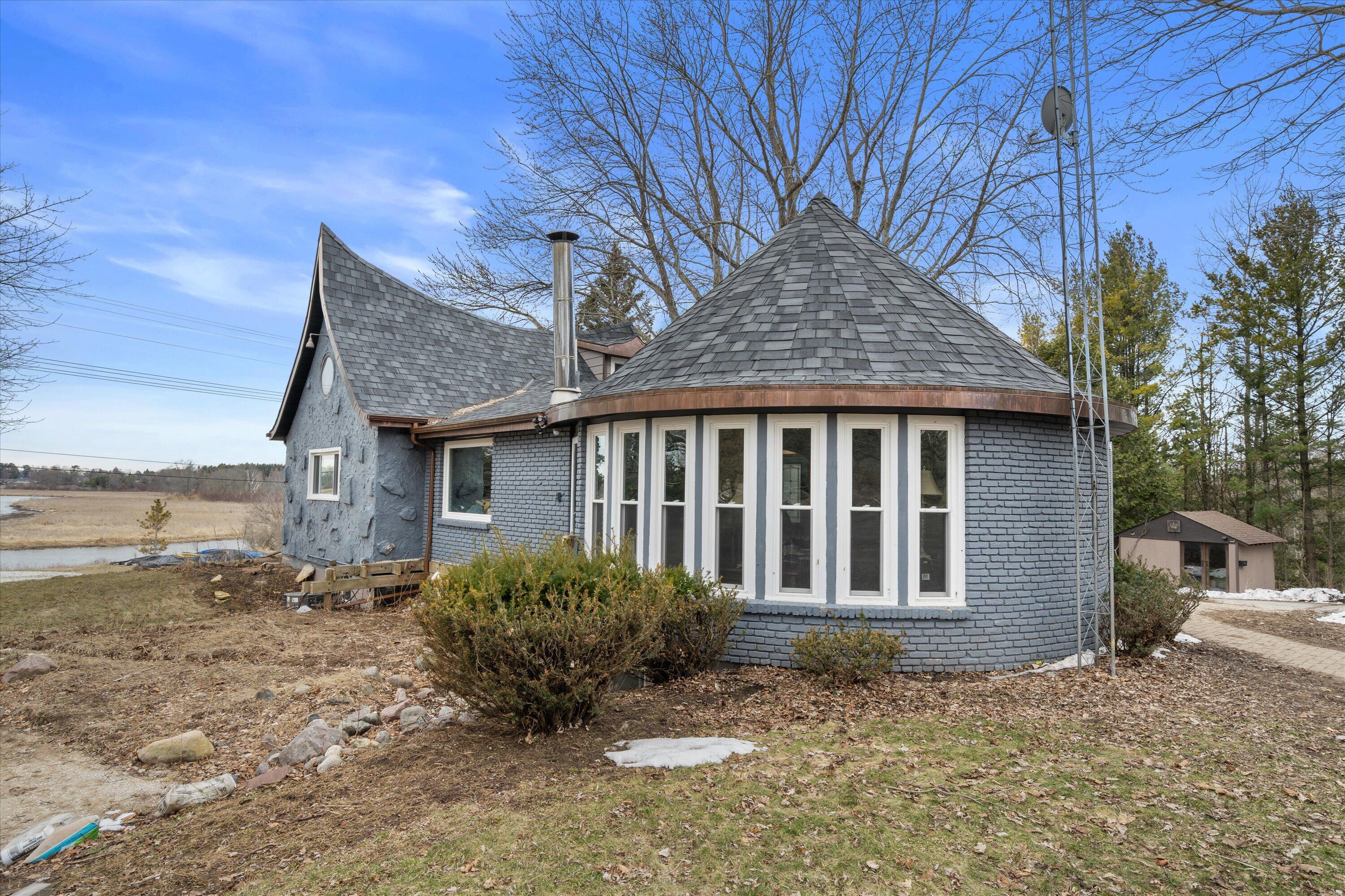4804 County Hwy VV Two Rivers, WI 54241 - Photo 39 of 60 View of house from pond