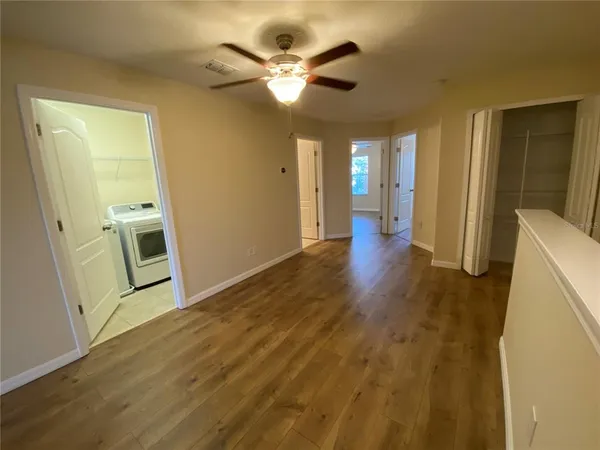 a view of a livingroom with a hardwood floor