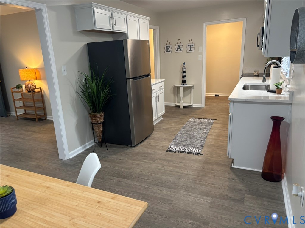 1185 Erica Road Montross, VA 22520 - Photo 12 of 32 Kitchen with stainless steel appliances, dark wood