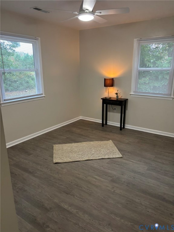 1185 Erica Road Montross, VA 22520 - Photo 21 of 32 Spare room featuring dark wood-type flooring and a