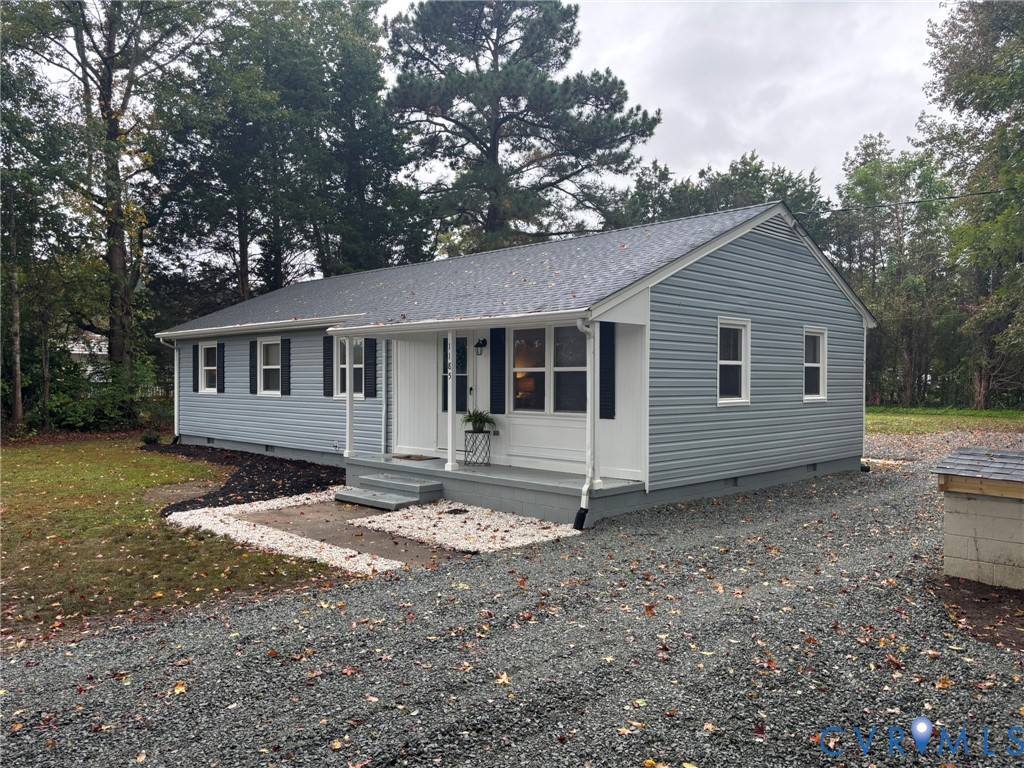 1185 Erica Road Montross, VA 22520 - Photo 3 of 32 View of front of house with crawl space, a porch,