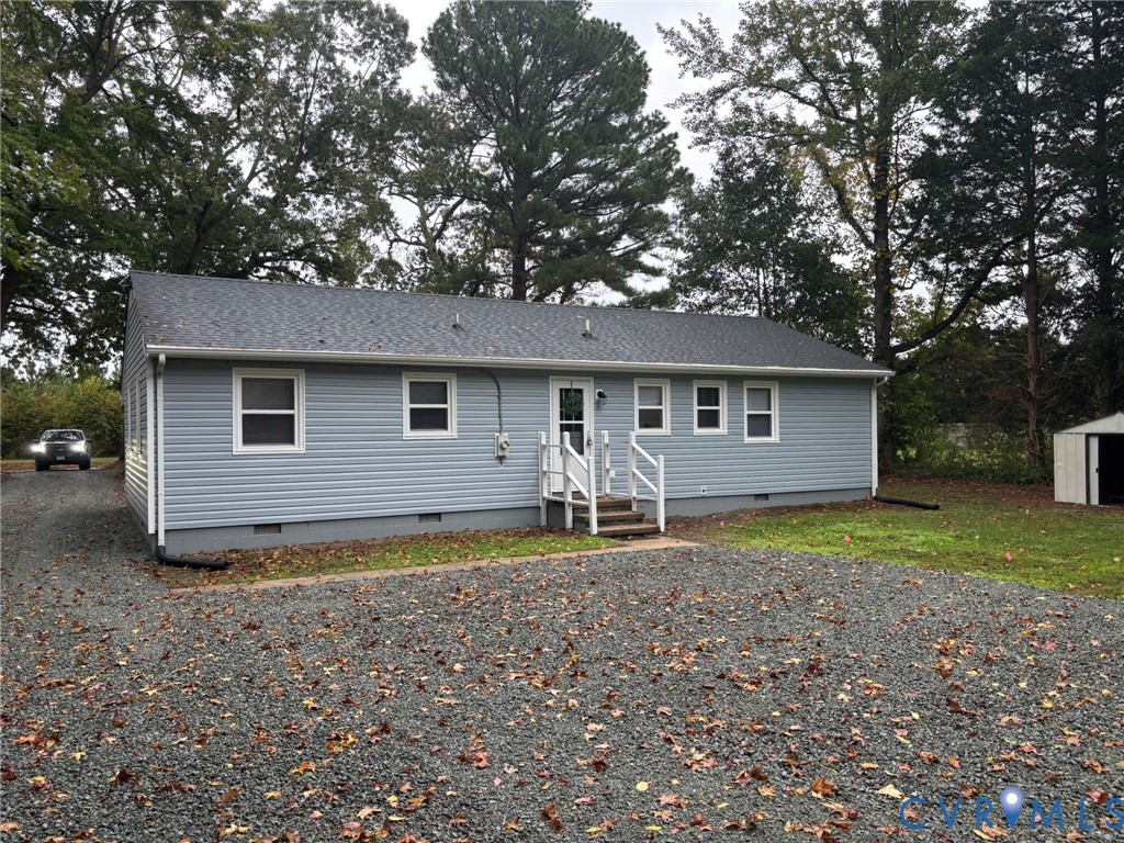 1185 Erica Road Montross, VA 22520 - Photo 4 of 32 View of front facade with crawl space, roof with s
