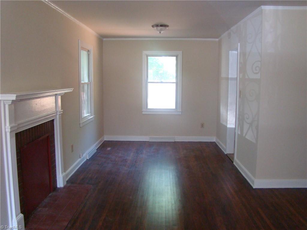 1406 Vaughn Road Burlington, NC 27217 - Photo 5 of 21 Living Room + Dining Area