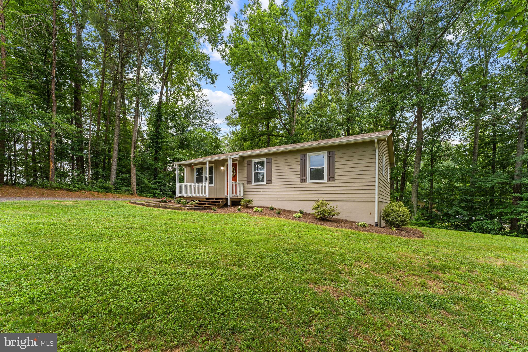 1821 James City Road Reva, VA 22735 - Photo 5 of 44 a front view of house with yard and green space