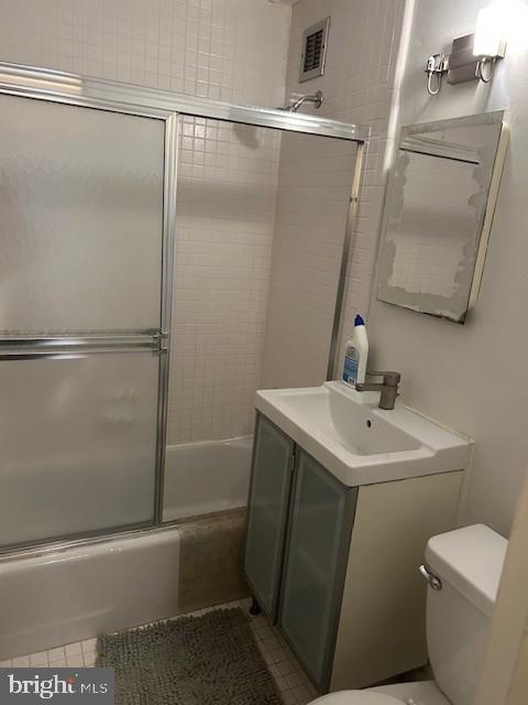1111 Arlington Boulevard, Unit 537 Arlington, VA 22209 - Photo 3 of 5 a bathroom with a sink toilet and shower