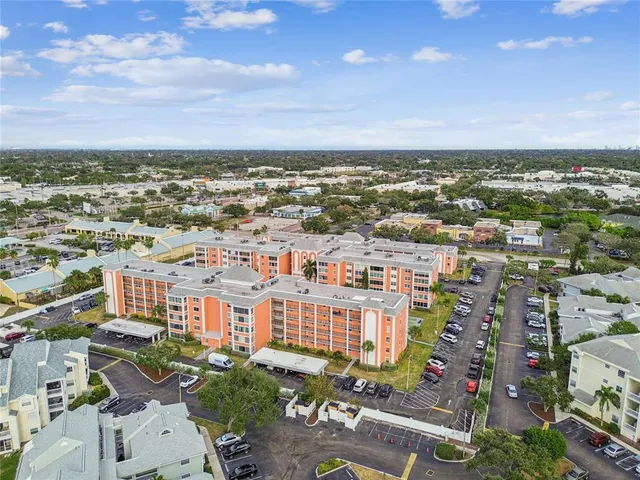an aerial view of a city with lots of residential buildings