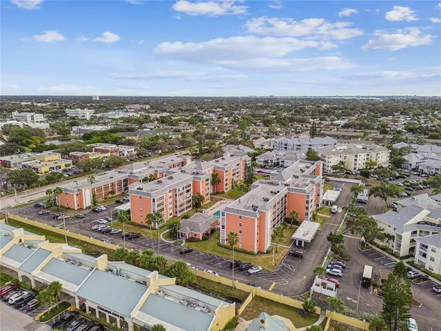 an aerial view of a city with lots of residential buildings