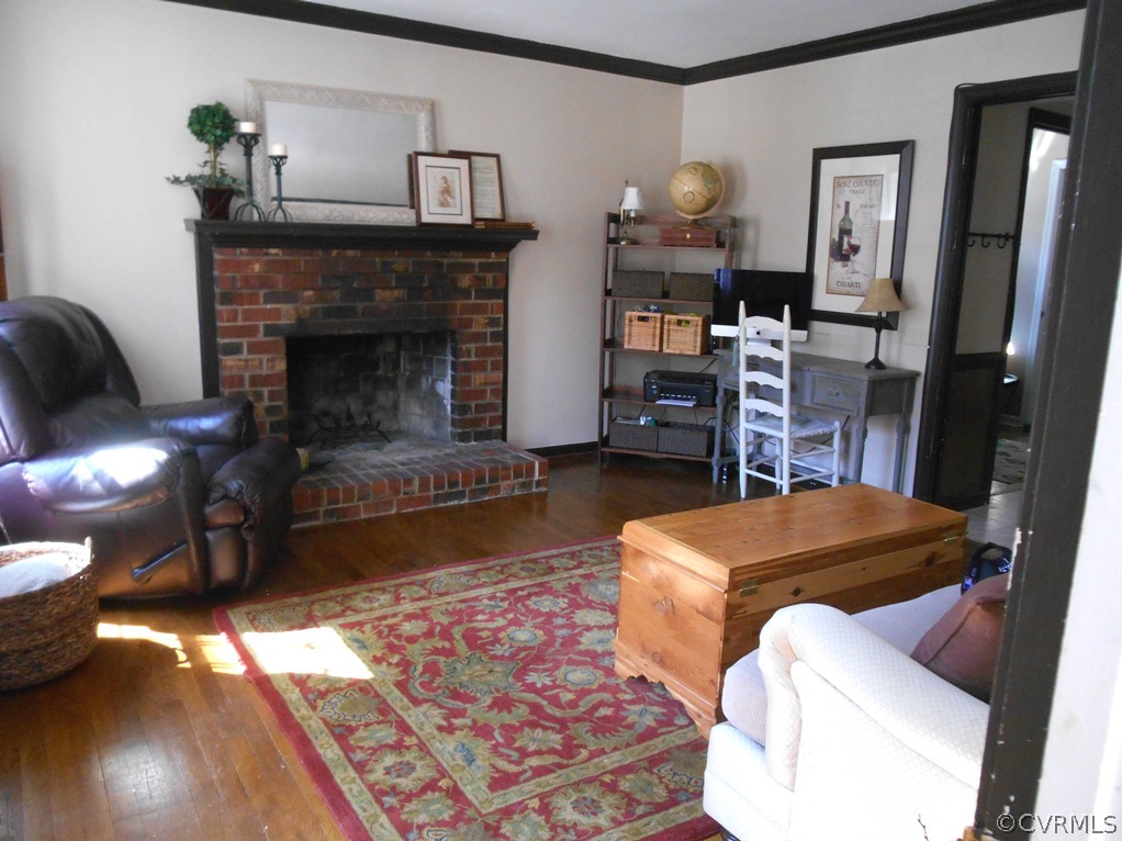 4904 Court Ridge Terrace Midlothian, VA 23112 - Photo 14 of 20 a living room with furniture and a fireplace
