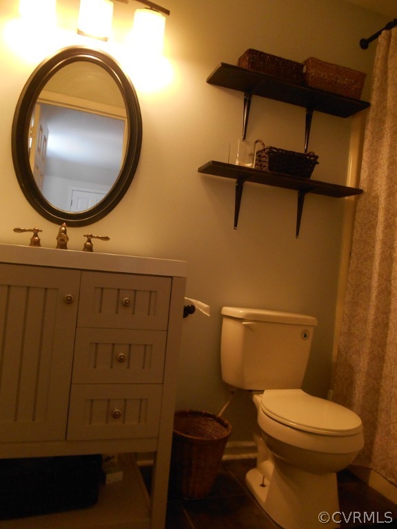 4904 Court Ridge Terrace Midlothian, VA 23112 - Photo 20 of 20 a bathroom with a toilet and a mirror