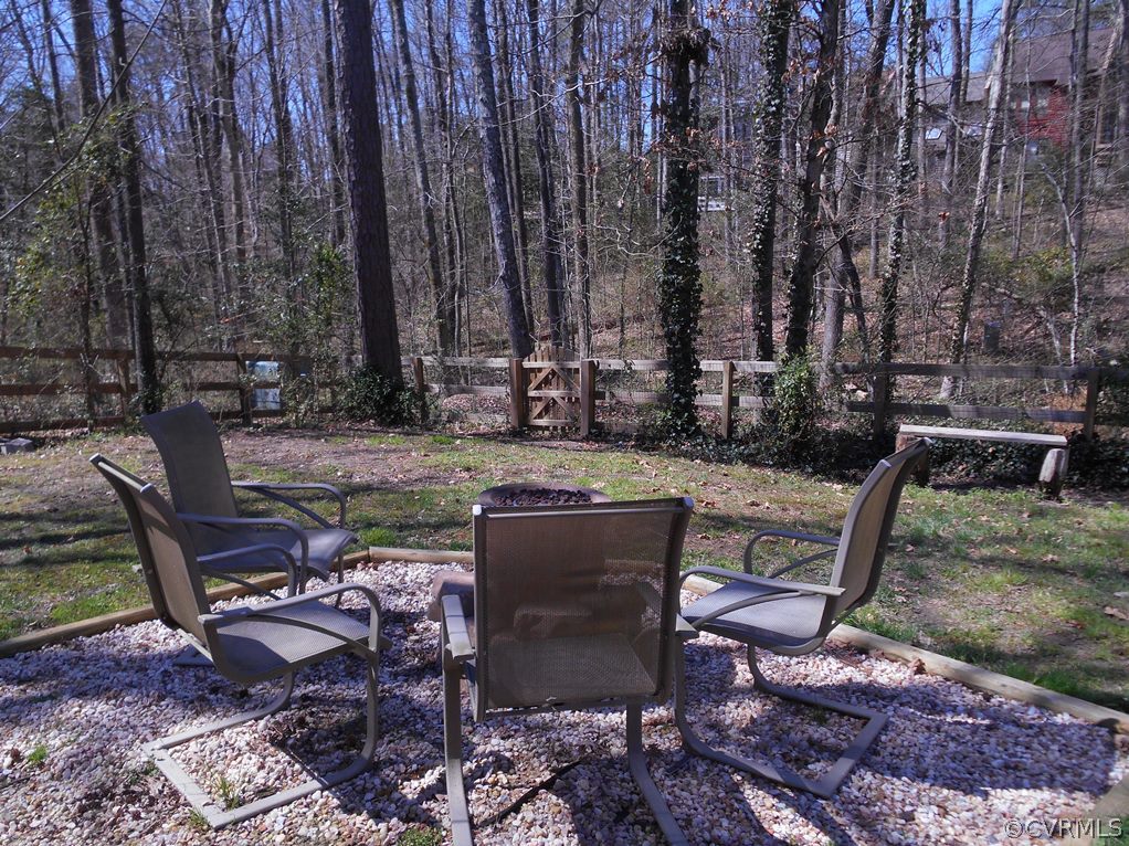 4904 Court Ridge Terrace Midlothian, VA 23112 - Photo 6 of 20 a view of a backyard with sitting area
