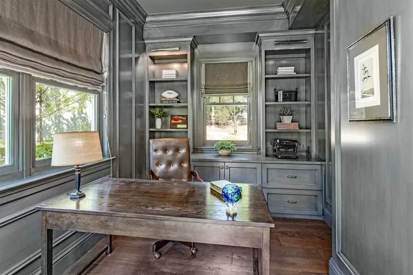 a kitchen with sink and window