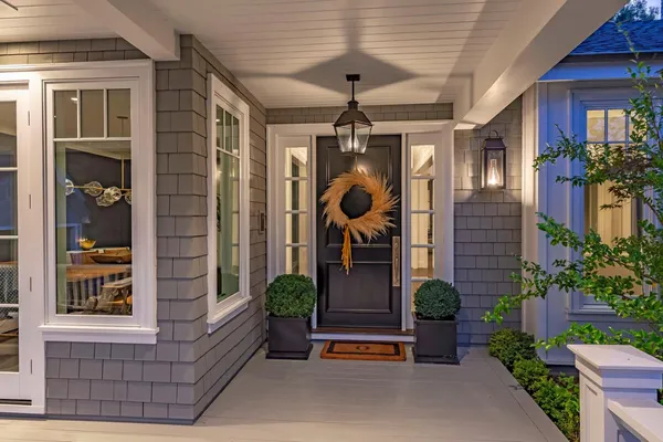 a front view of a house with a porch