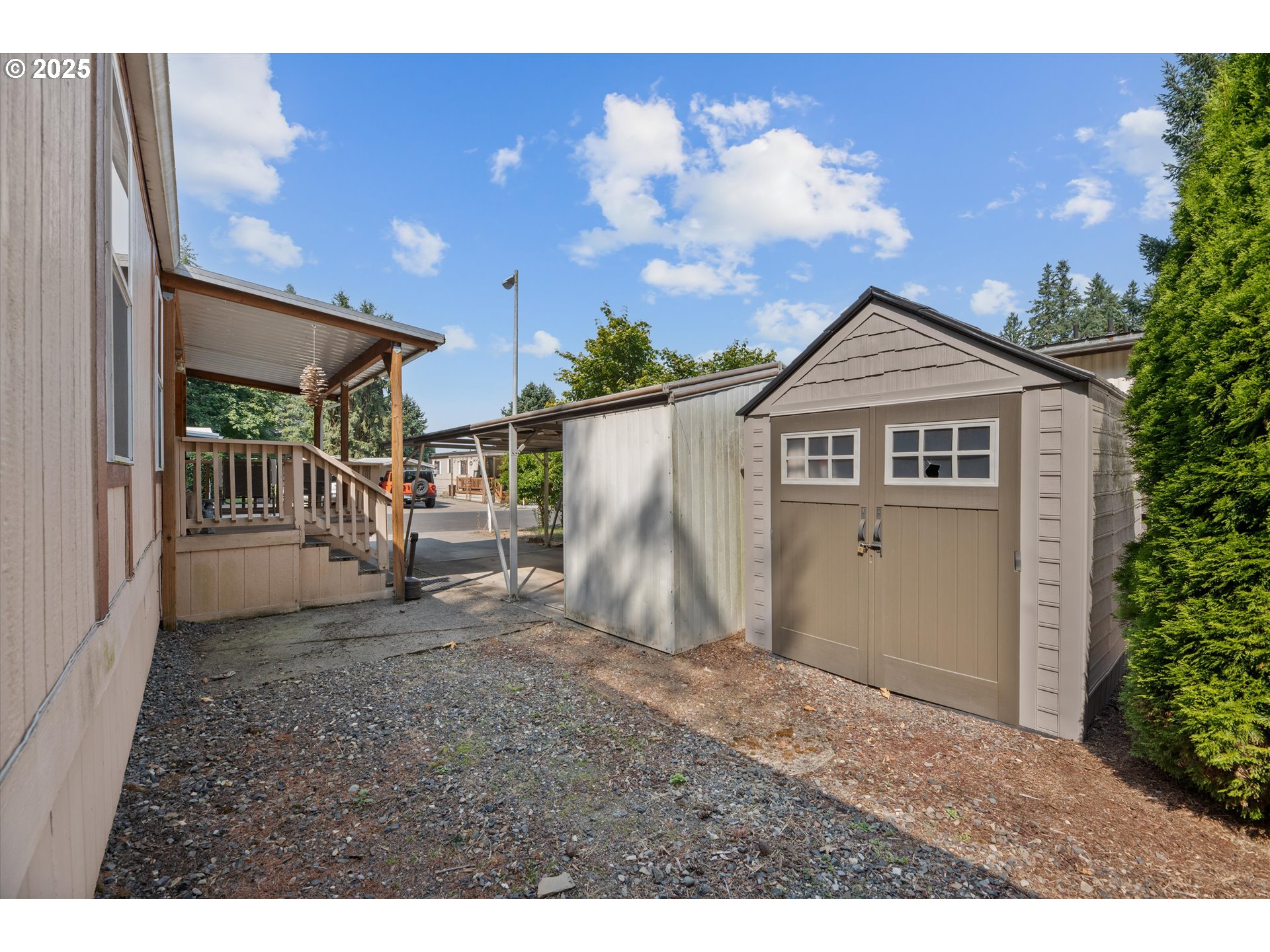 17655 Bluff Road, Unit 42 Sandy, OR 97055 - Photo 19 of 23 a view of a house with a yard